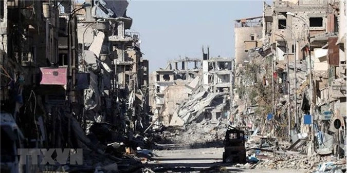 Cảnh đổ nát tại Raqqa, Syria. (Ảnh: IRNA/TTXVN). Cảnh đổ nát tại Raqqa, Syria. (Ảnh: IRNA/TTXVN).