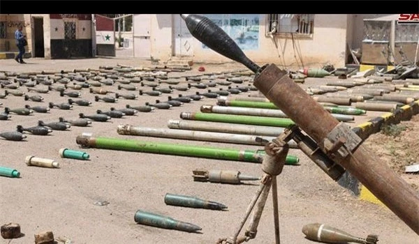 Phiến quân nộp lượng vũ khí khổng lồ cho quân đội Syria 