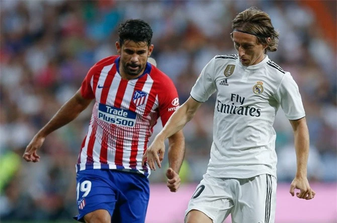 Modric (áo trắng) cùng các đồng đội không thể vượt qua Atletico.