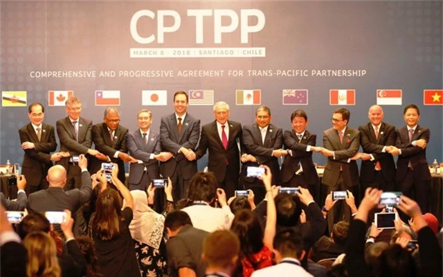 
Đại diện các quốc gia thành viên CPTPP chụp ảnh lưu niệm sau lễ ký kết hồi tháng 3. (Ảnh: Reuters)
