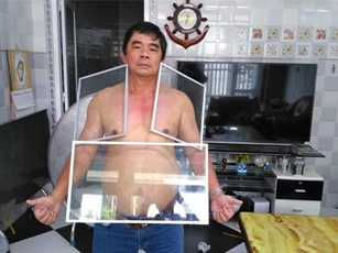Người đàn ông Tiền Giang 'kỳ lạ' hút kim loại, đá dính chặt người
