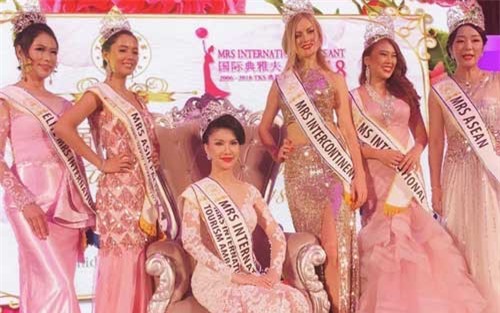 Loan Vương đăng quang Hoa hậu Quý bà quốc tế 2018