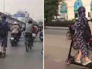 Clip: Màn lái scooter cực điêu luyện của 'nữ Ninja' trên phố Hà Nội