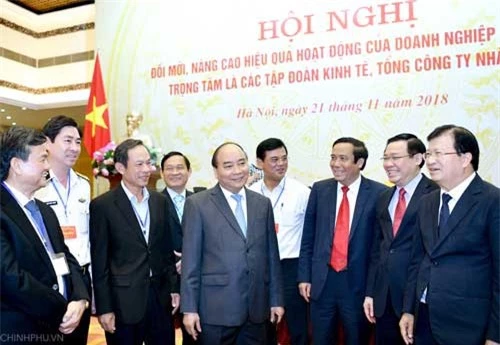 Thủ tướng Nguyễn Xuân Phúc, Phó Thủ tướng Vương Đình Huệ, Phó Thủ tướng Trịnh Đình Dũng cùng các đại biểu dự Hội nghị. Ảnh: VGP/Quang Hiếu