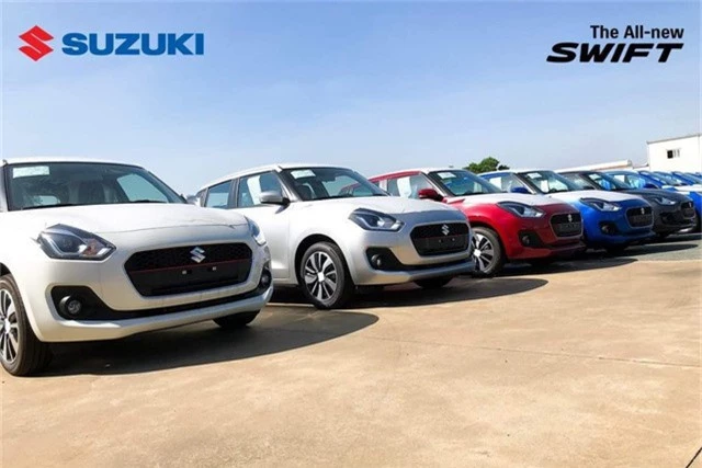 Suzuki Swift mới về ngập kho, sẵn sàng bung hàng, giá dự kiến giảm 60 triệu đồng - Ảnh 1.