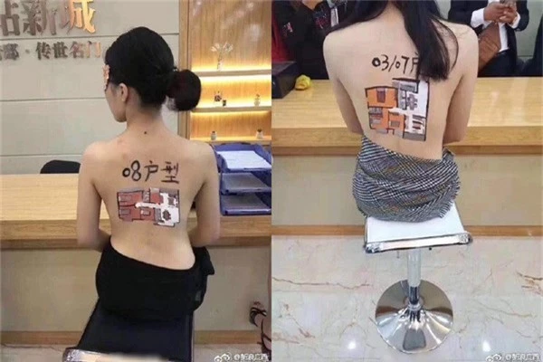 Bản vẽ các căn hộ mà công ty đang bán được vẽ trên lưng những người mẫu ngực trần