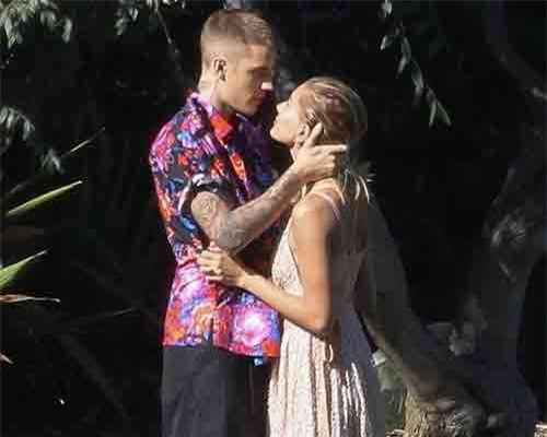 Vợ chồng Justin Bieber tình tứ trong buổi chụp hình