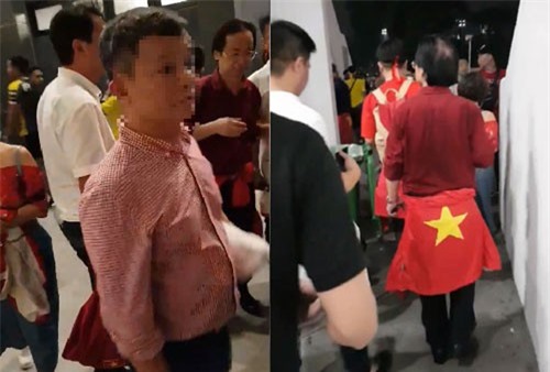 Ông Nguyễn Lân Trung quấn Quốc kỳ ngang hông?