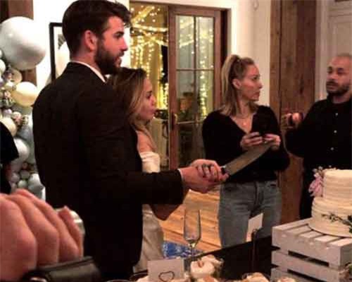 Lộ ảnh Miley Cyrus và Liam Hemsworth bí mật kết hôn