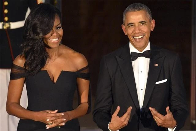 Vợ chồng ông Obama được yêu thích nhất nước Mỹ - Ảnh 1.