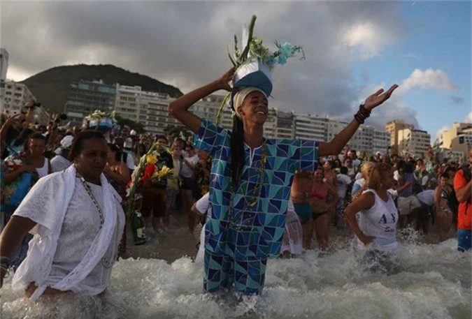 Rio de Janeiro, Brazil Believers of Afro-Brazilian religions pay tribute to Yemanja, goddess of the sea, during a traditional celebration ahead of New Years eve on Copacabana Beach in Rio de Janeiro, Brazil on Dec. 29.