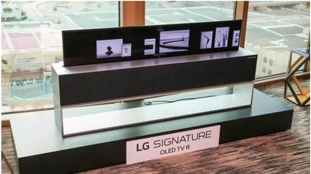 LG trình diễn TV màn hình cuộn đầu tiên trên thế giới - Ảnh 4.