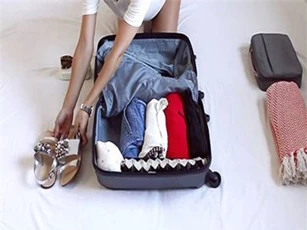 CLIP: Hướng dẫn cách xếp đồ vào vali gọn gàng