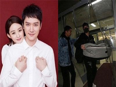 Vợ chồng Triệu Lệ Dĩnh đưa con trai rời khỏi bệnh viện vào ban đêm