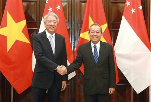 Phó Thủ tướng Trương Hòa Bình hội đàm Phó Thủ tướng Singapore Tiêu Chí Hiền