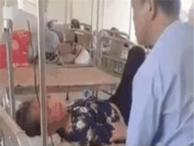 Clip: Chồng thẳng tay tát vợ đang nằm trên giường bệnh