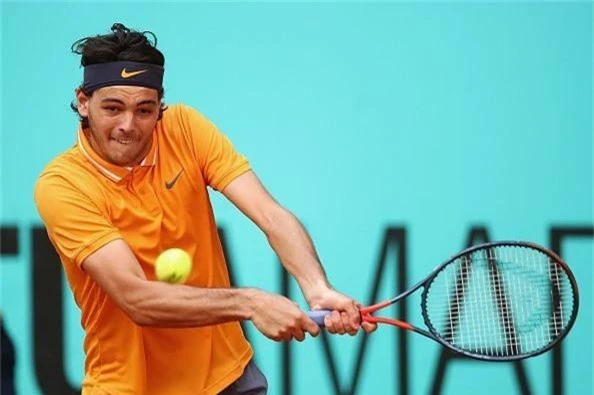 Thắng dễ Taylor Fritz, Novak Djokovic thẳng tiến vào vòng 3 Madrid mở rộng 2019 - Ảnh 1.