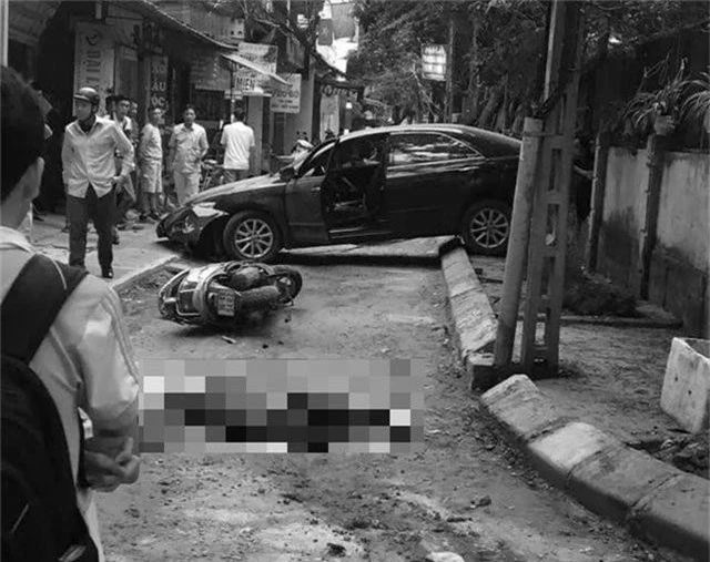 Hà Nội: Nghi vấn nữ tài xế nhầm chân ga lùi xe tông chết một phụ nữ - 1