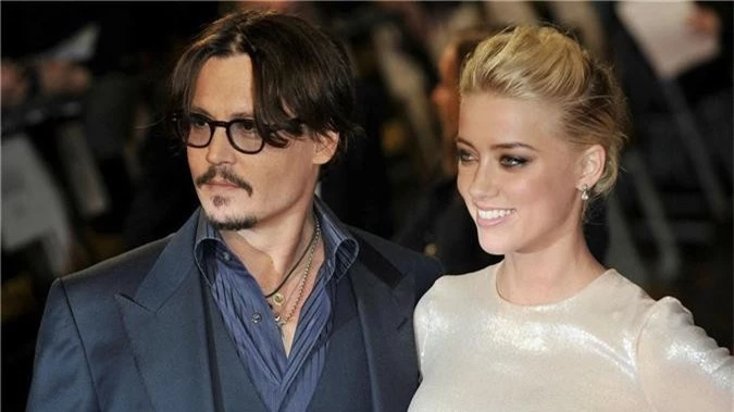 Cô vợ cũ tai tiếng của Johnny Depp trải lòng về vụ phát tán ảnh nóng năm 2014 - Ảnh 1.