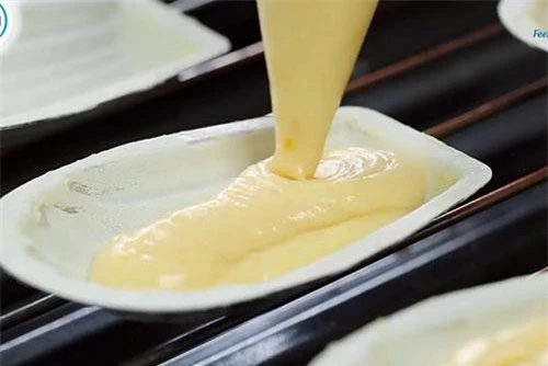 Bánh vỏ sò Madeleine xốp mềm với phần nhân thơm lừng bơ sữa.