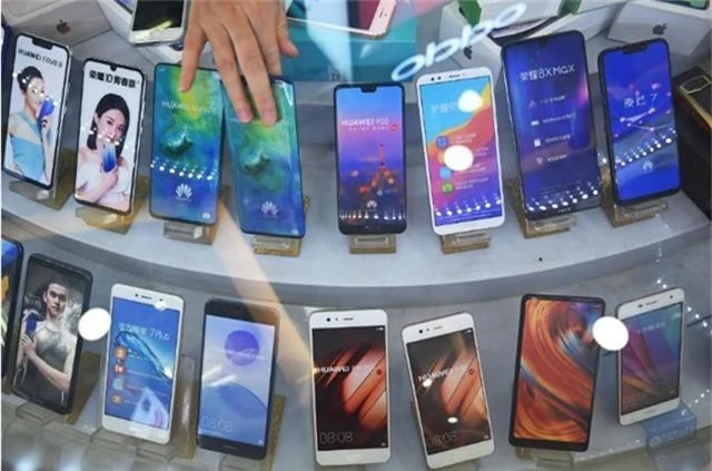 Huawei phản bác tin đồn cắt giảm sản xuất điện thoại thông minh - 1