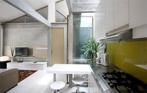 Nhà cấp 4 có nét đẹp thanh xuân từ cây cỏ phủ xanh bê tông thô cứng với chi phí 345 triệu