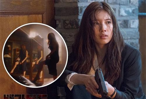 Suzy khoe chân dài miên man, kéo váy gài súng cực điêu luyện trong phim mới đóng cặp cùng Lee Seung Gi