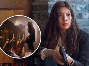 Suzy khoe chân dài miên man, kéo váy gài súng cực điêu luyện trong phim mới đóng cặp cùng Lee Seung Gi