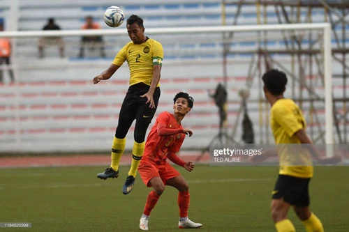 U22 Malaysia (áo vàng) không thể hạ U22 Myanamar. Ảnh: Getty.