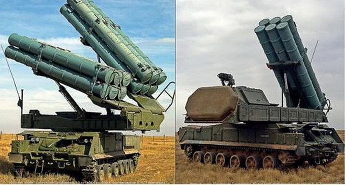 Xe nạp đạn kiêm chấp hành phóng (TEL) 9A316M và xe mang phóng tự hành (TELAR) 9A317M của tổ hợp tên lửa phòng không tầm trung Buk-M3. Ảnh: TASS.
