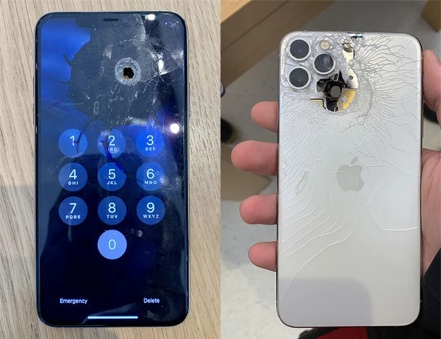 Bị đạn bắn xuyên thủng một lỗ, iPhone 11 Pro Max vẫn vô tư dùng như chưa có chuyện gì xảy ra - Ảnh 1.