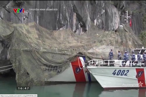 Xem tàu cảnh sát biển Việt Nam nguỵ trang, ẩn mình sát vách đá