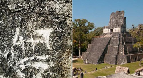 Hai du khách hồn nhiên khắc chữ ‘A + T’ lên đền thiêng 1.300 tuổi