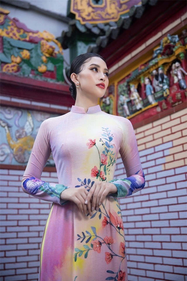 Hoa hậu Tiểu Vy khoe sắc mặn mà trong tà áo dài đón Tết - Ảnh 8.