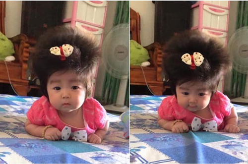 Cô nhóc 3 tháng tuổi có mái tóc dày và xù bông như trẻ 2 - 3 tuổi khiến nhiều người ngỡ ngàng