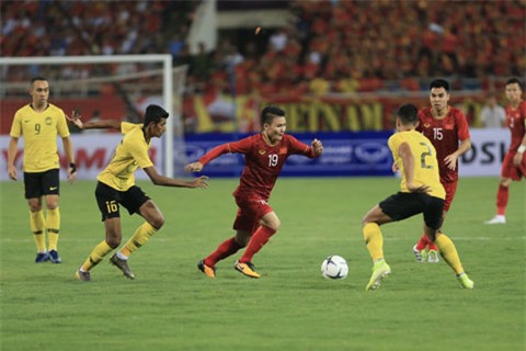 Quang Hải (giữa) và đồng đội sẽ gặp lại Malaysia trên sân của đối phương vào ngày 31/3 tới Ảnh: ĐỨC CƯỜNG