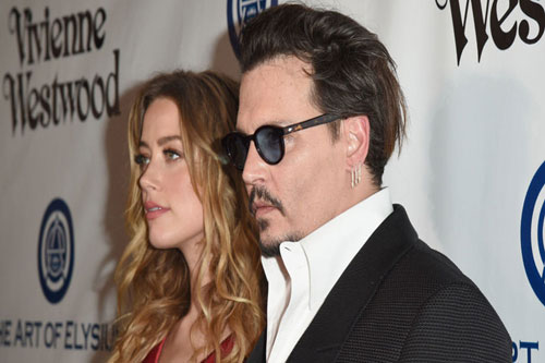 Hóa ra Johnny Depp bị vợ cũ đánh đập
