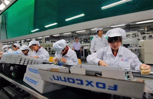Chuỗi sản xuất của Apple tại Trung Quốc sản xuất trở lại vào 10/2 - Ảnh 1.