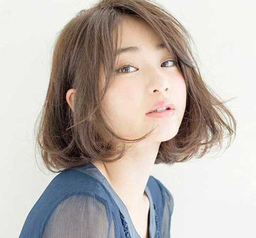 Những kiểu tóc  cực xinh dành riêng cho những cô nàng mặt tròn, cằm ngắn