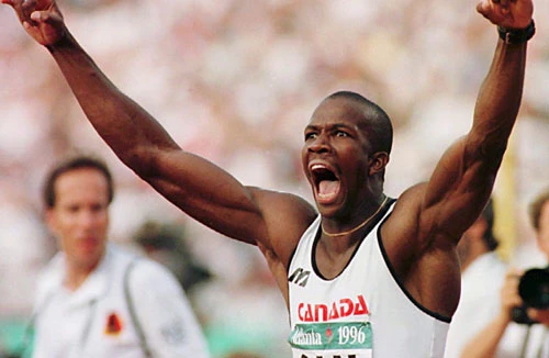 =9. Donovan Bailey (Canada). 9,84. Ảnh: Olympic.ca.