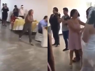 Bạn gái cũ của chú rể xông vào đám cưới tát cô dâu và câu nói khiến quan khách chứng kiến "hoang mang"