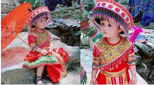 Xuất hiện bé gái diện trang phục dân tộc có đôi mắt "biết nói" khiến bao người "xuyến xao"