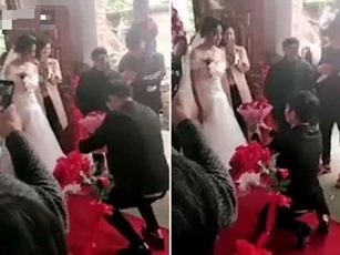 Chú rể quỳ gối cầu hôn lãng mạn nhưng cô dâu vẫn "trơ như tượng"