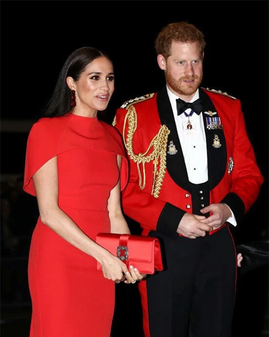 Vợ chồng Harry - Meghan dự sự kiện ở London tối 7/3. Ảnh: AFP.