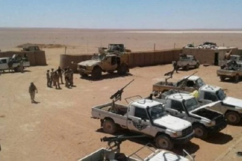 Các chiến binh thân Mỹ đã quyết định mang nhiều vũ khí về đầu hàng Quân đội chính phủ Syria. Ảnh: Al Masdar News.