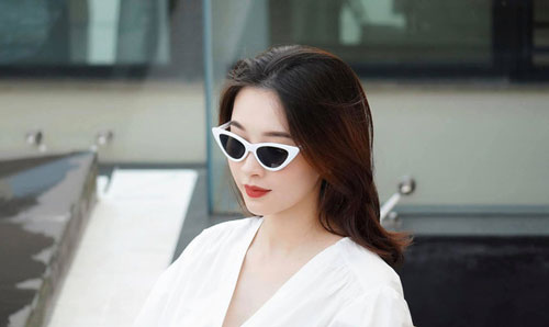 Hoa hậu Đặng Thu Thảo đẹp như nữ thần qua ống kính của chồng