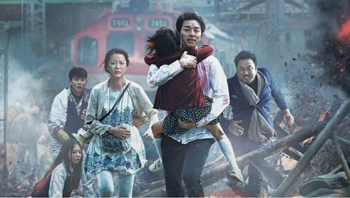 Train to Busan là bộ phim hấp dẫn từng khuynh đảo phòng vé năm 2016. Phim lấy bôi cảnh đất nước Hàn Quốc bị tấn công bởi 1 loại virus bí ẩn. Chúng có khả năng biến con người thành xác sống hung hăng và khát máu. Có mặt trên chuyến tàu là 1 người cha cùng con gái, hai vợ chồng chuẩn bị sinh con và 1 vài cậu học sinh cấp 3. Khi đại dịch bùng phát, họ phải đương đầu chiến đấu để bảo vệ người thân của mình và giành lại sự sống. Phim thu về 93 triệu USD doanh thu.