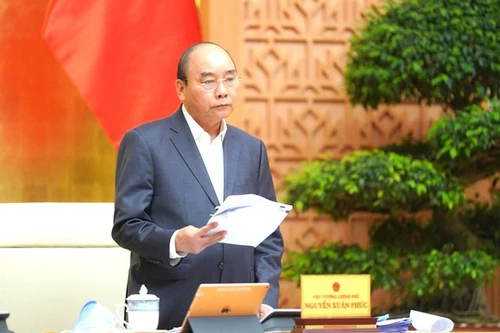 Thủ tướng Nguyễn Xuân Phúc tại cuộc họp bàn trước đó về việc xây dựng gói hỗ trợ 62.000 tỷ đồng giúp người dân bị ảnh hưởng bởi đại dịch COVID-19.