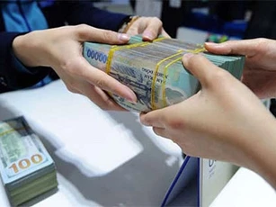 Covid-19 : NHNN yêu cầu miễn phí chuyển tiền hỗ trợ người dân gặp khó khăn