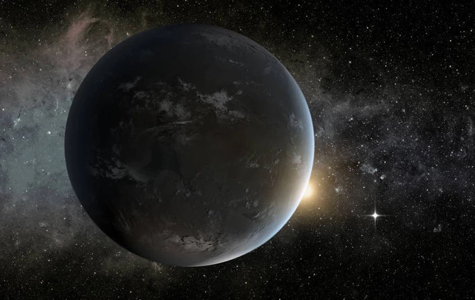 Ảnh đồ họa của NASA mô tả một ngoại hành tinh có thể mang sự sống, nằm trong vùng Goldilocks của sao K mẹ thấp thoáng ánh vàng cam phía xa - Ảnh: NASA